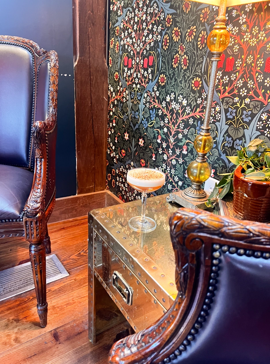 An artisan cocktail staged in an elevated restaurant in Apex North Carolina