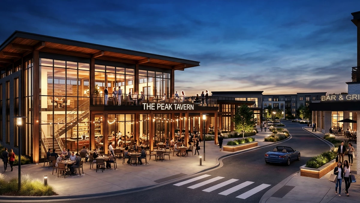 Contemporary dining destination featuring glass facade patio seating and illuminated evening streetscape