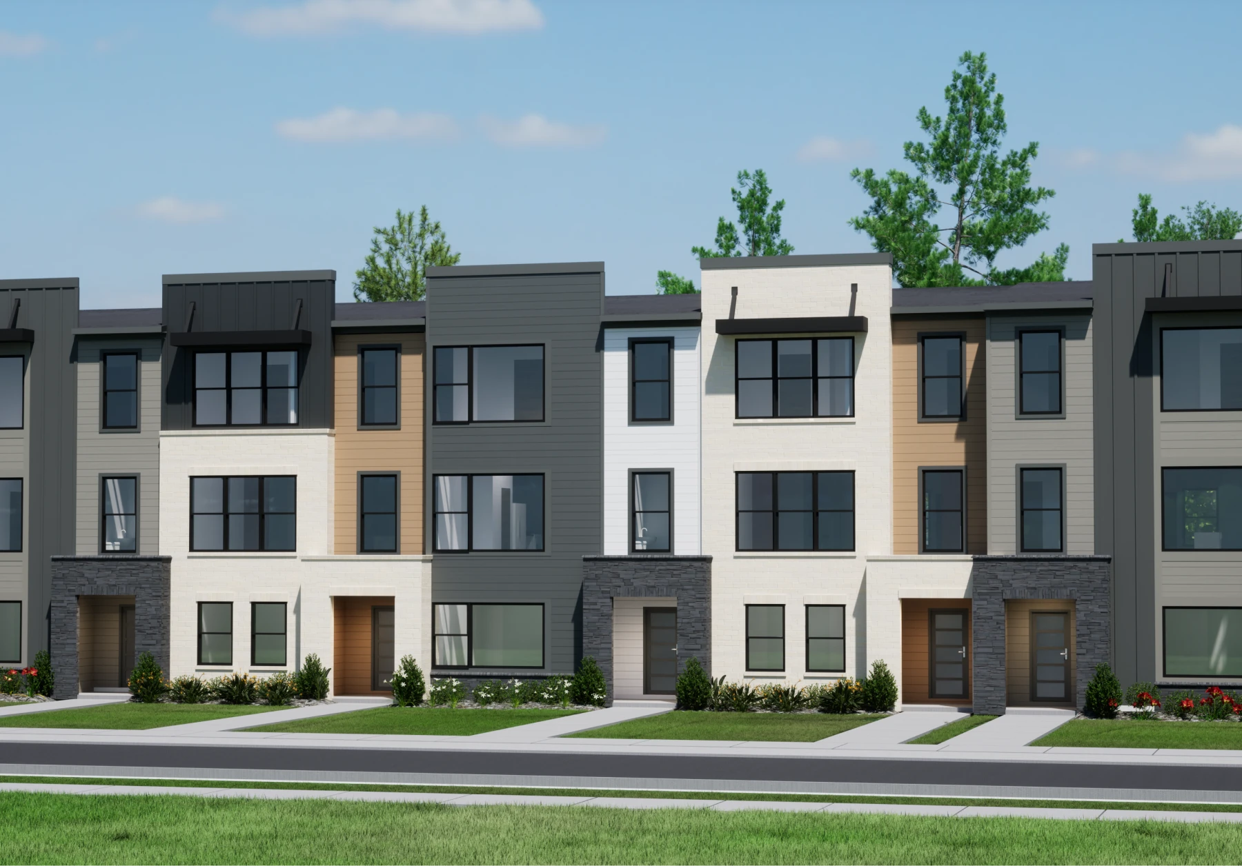 Contemporary urban townhomes featuring neutral exterior colors stone accents and symmetrical architectural design